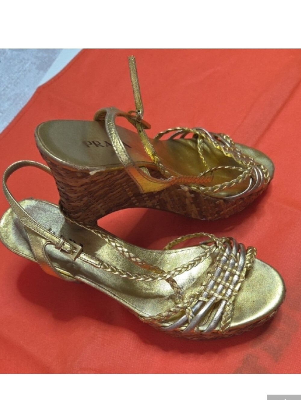 Prada metallic leather braided wedge sandals.